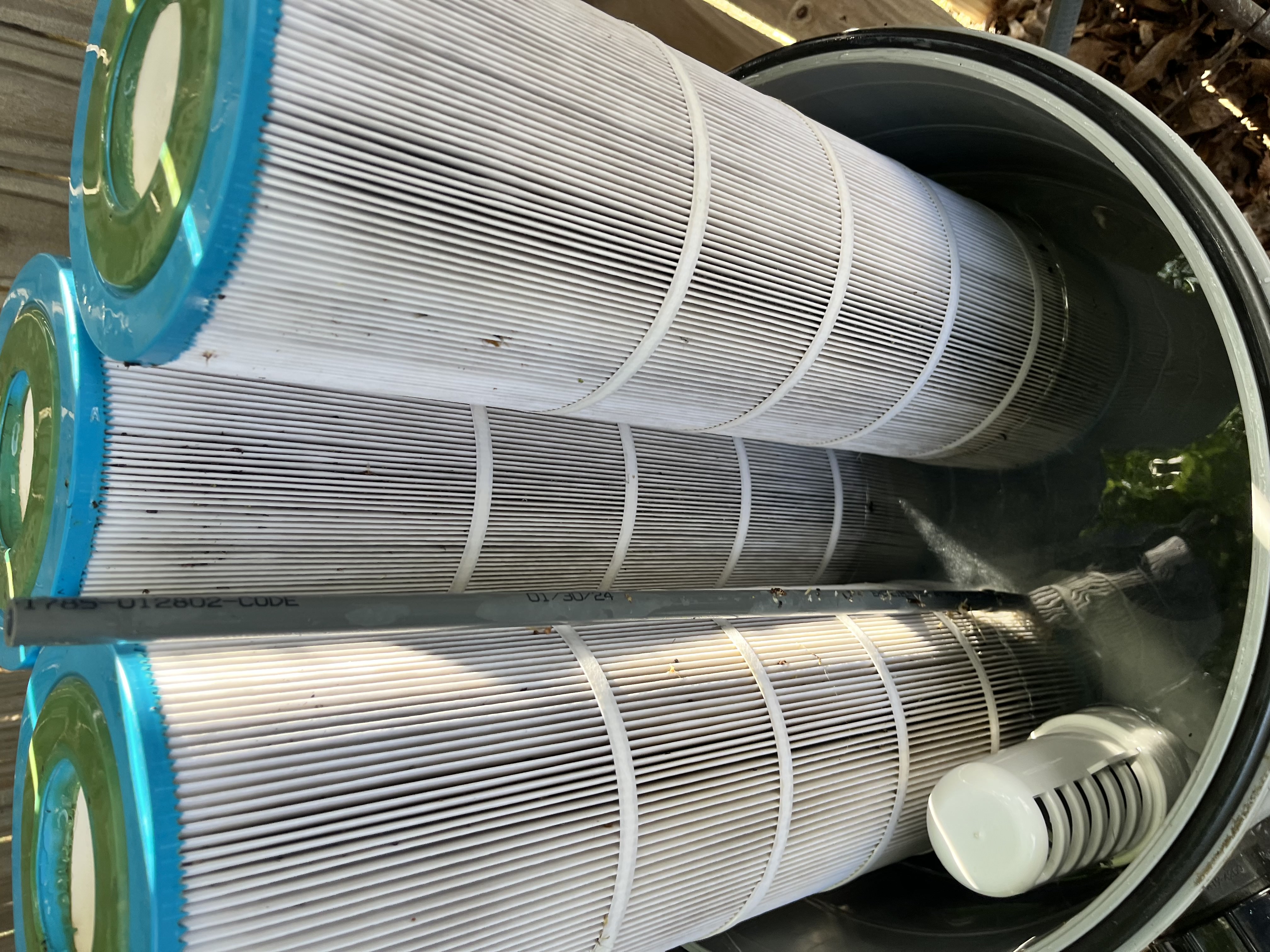 Pool cartridge filter housing opened during professional filter cleaning in Coppell TX and north DFW