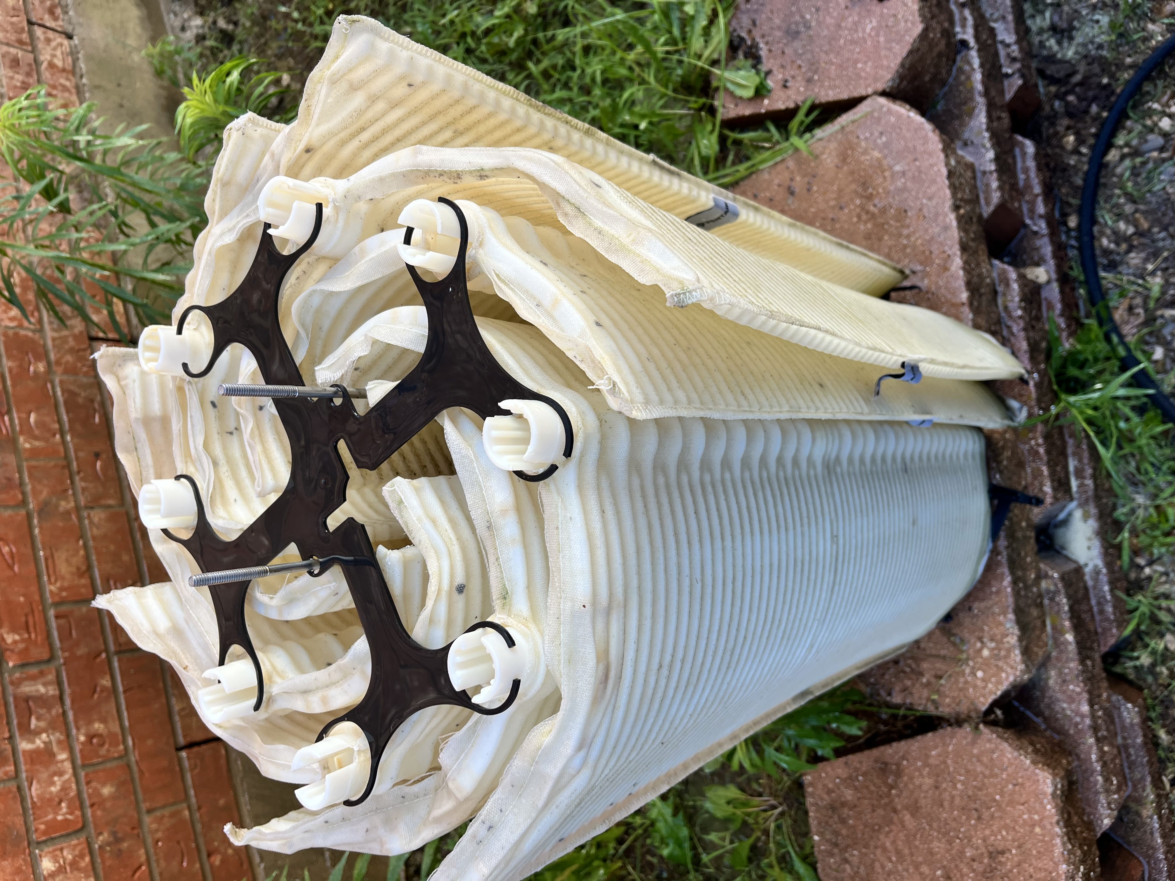 D.E. pool filter grids cleaned during professional filter maintenance in Highland Park TX and the Park Cities